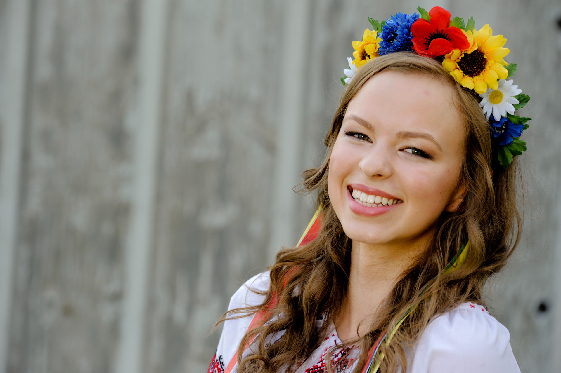 Troy , Michigan senior pictures photo of a high school senior posing in her traditional Russian dance outfit for her senior pictures in Troy, Michigan.